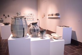 ceramics on pedestals in gallery