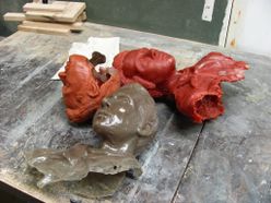 pile of busts on table